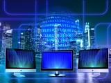 Bildschirme vor einer Skyline mit Linien als Zeichen des Datenverkehrs